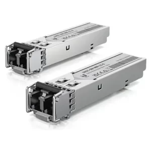 Two Ubiquiti gray SFP transceiver modules on white background.